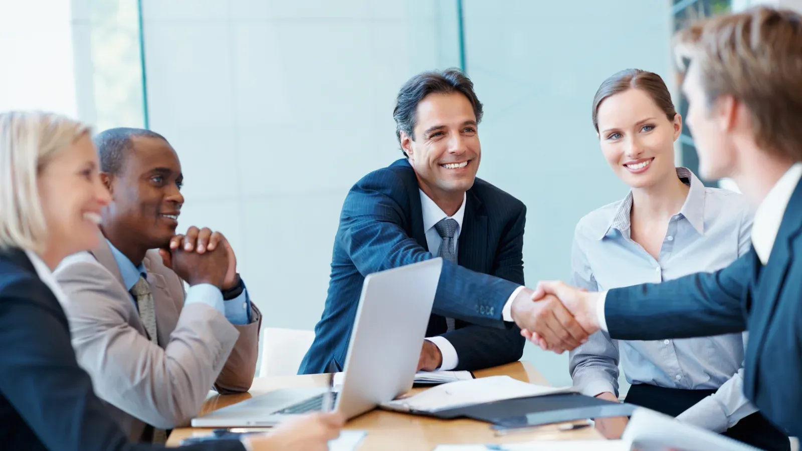 People collaborating and applying SOAR insights at work